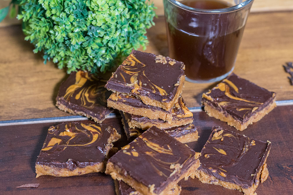 No Bake Chocolate Peanut Butter Bars with a tea