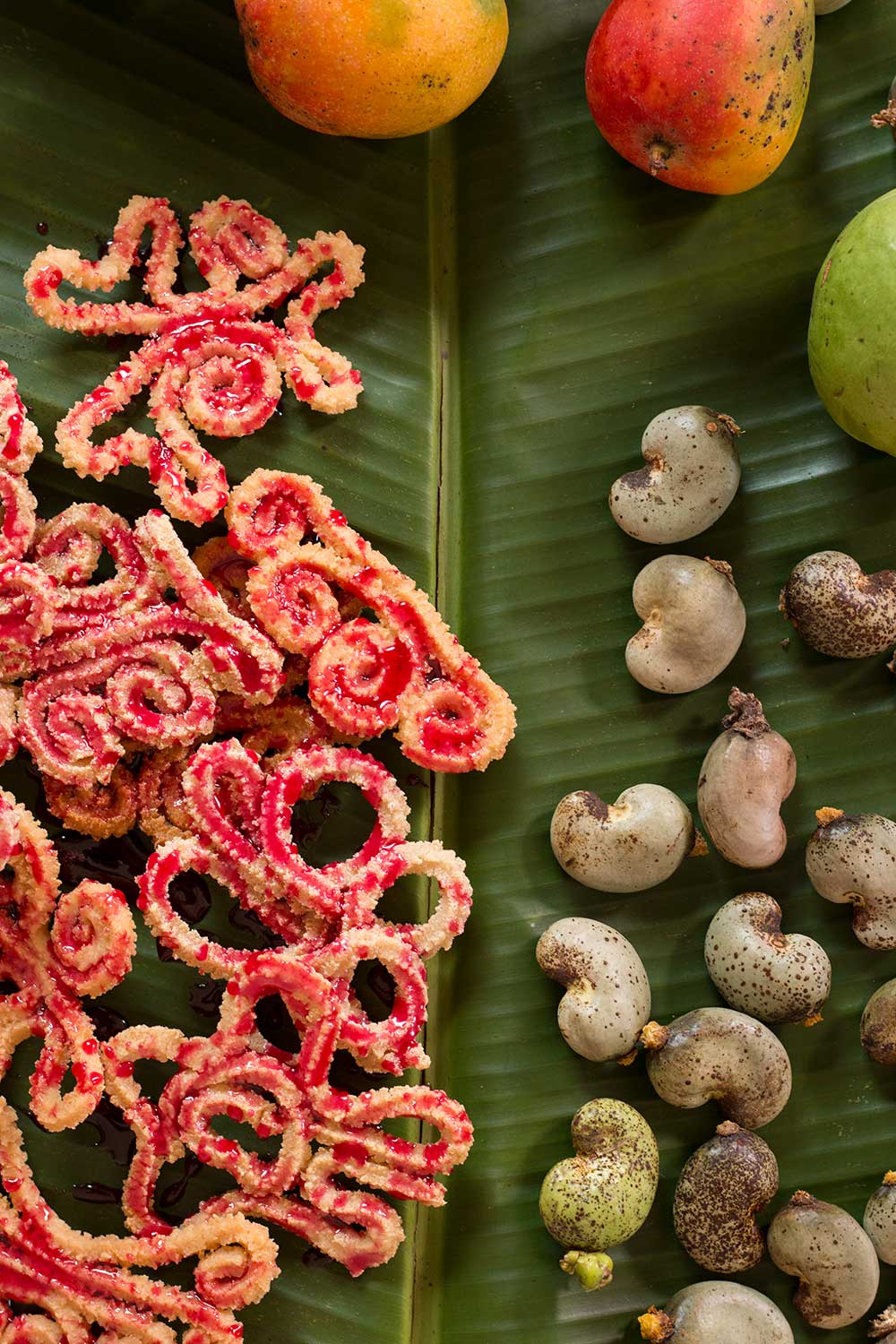 Prepared Vibara kept on a banana leaf with cashe fruits