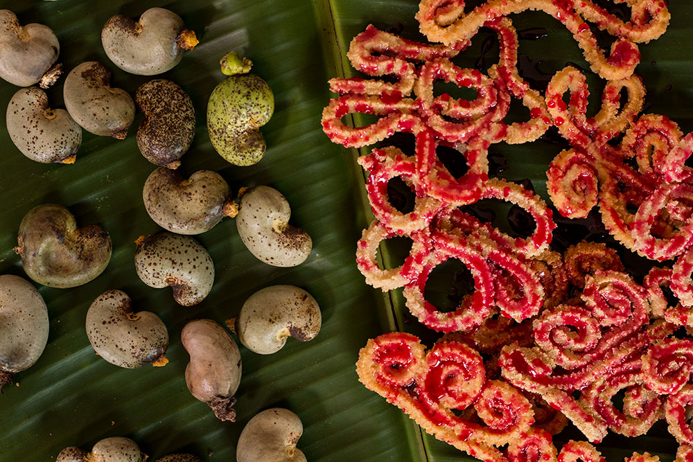 Prepared Vibara kept on a banana leaf with cashe fruits